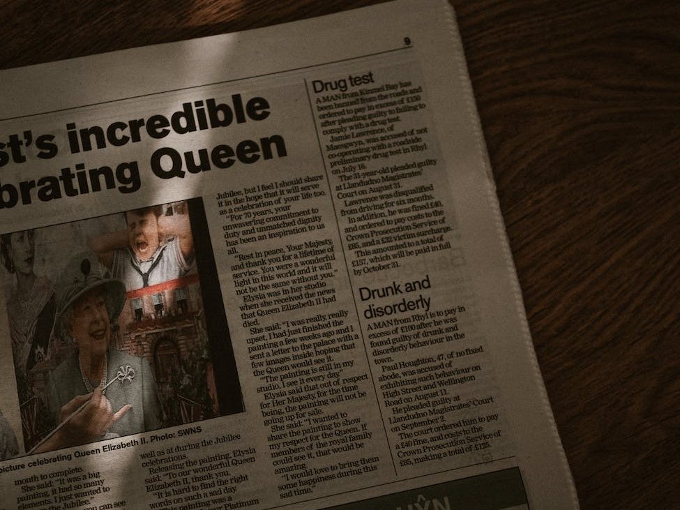 dark image of a newspaper on wooden table