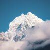 snow covered mountain under blue sky