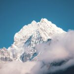 snow covered mountain under blue sky